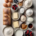 Delicious Crème Brûlée French Toast topped with caramelized sugar and fresh berries.