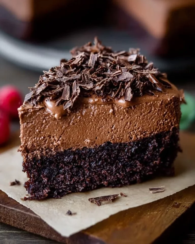Delicious easy chocolate mousse cake topped with chocolate shavings