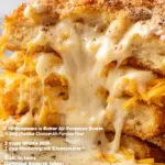 Delicious ultimate cheese sauce drizzled over crispy fries